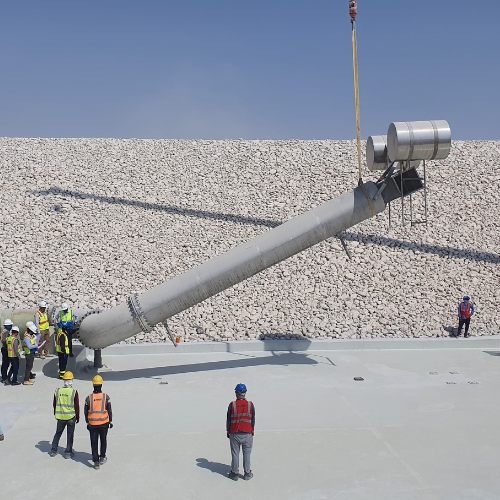 One of four 40" Large Floating Suction Units being placed in a reservoir in the Qatar desert